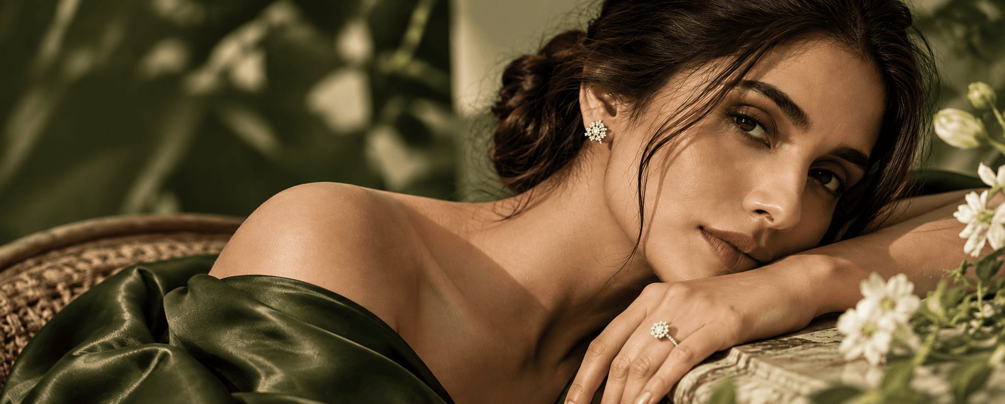 Woman with diamond earrings resting on her shoulder